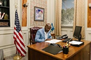 A man at a desk in an office