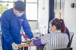 Doctor measuring a patient's blood pressure