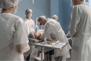 A group of people in white protective gear