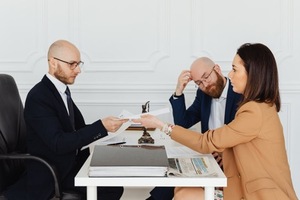 A group of people sitting at a table