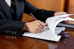 Lawyers signing a Document