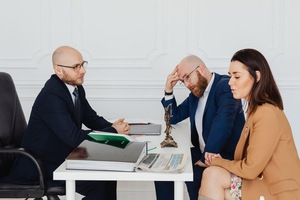 A group of people sitting at a table