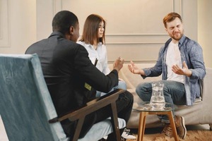 A group of people sitting at a table