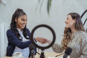 A person shaking hands with another person