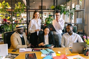 A group of people in a meeting